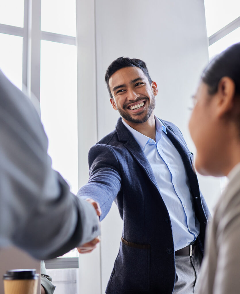 Pleased to meet you. Shot of two business people shaking hands during a meeting